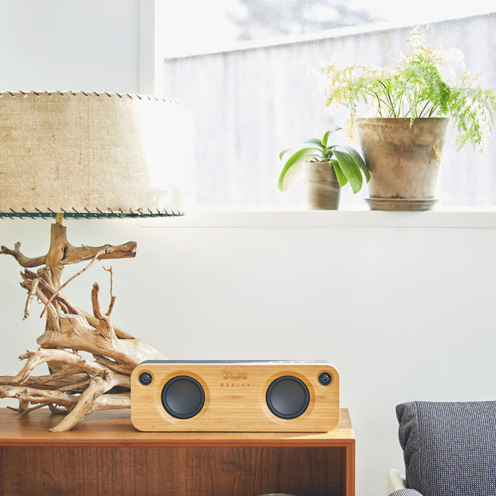 Get Together Bluetooth Speaker - Get Together Bluetooth Speaker on a table with a potted plant in the background - The House of Marley